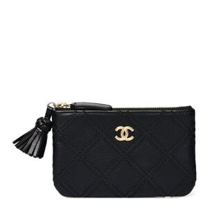 SOLD CHANEL Lambskin Stitched Small Cosmetic Case Black